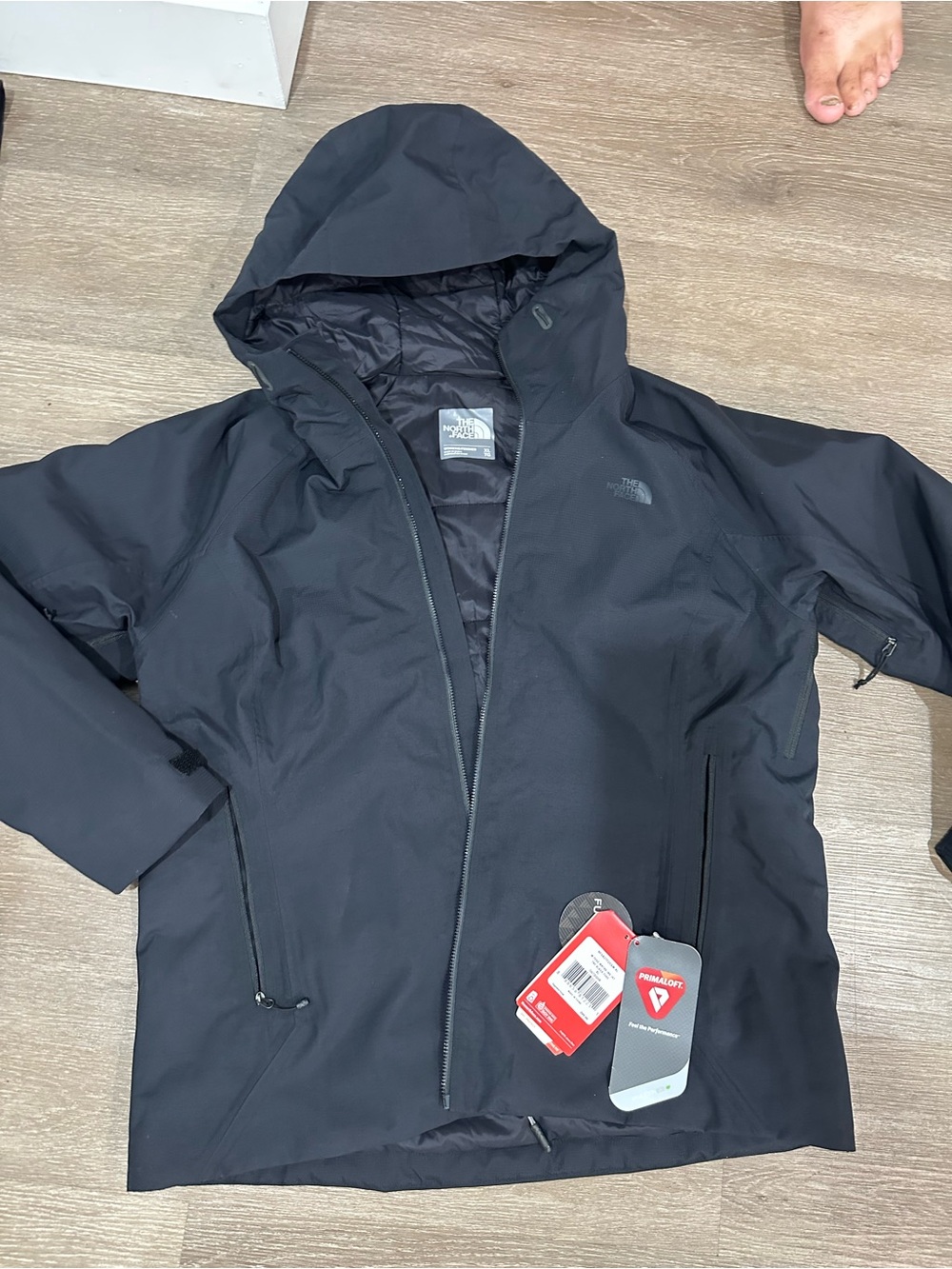 The North Face women’s Black Hooded Raincoat